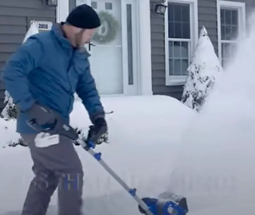 Snow joe cordless snow shovel in use