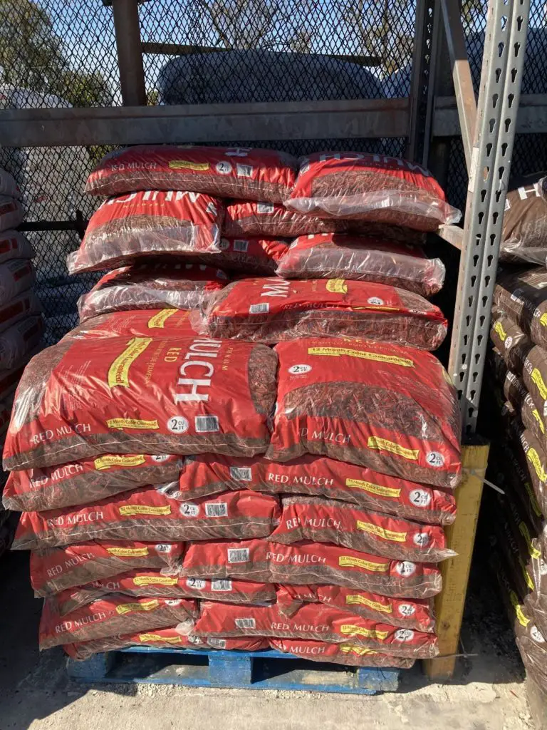 Premium red mulch pile at Lowes